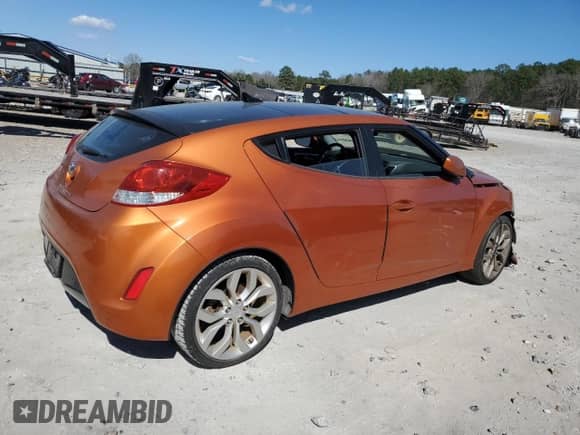 2012 Hyundai Veloster w/Red Int z VIN KMHTC6AD9CU044547, wystawiony jako Copart lot #72633624 z przebiegiem 69 261 mil mil oraz Szkoda całkowita • Salvage title. Historia ofert i sprzedaży dostępna na DreamBid. Obrazek 3.