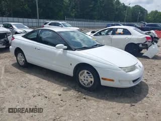 ✅ 1999 Saturn SC • VIN: 1G8ZY1270XZ314215 • Лот: 42468782. Опубликован ранее на IAAI с пробегом 152 264 миль. Бесплатный доступ к архиву аукционных продаж из США и подробный отчёт об истории автомобиля на DreamBid. Изображение 1.