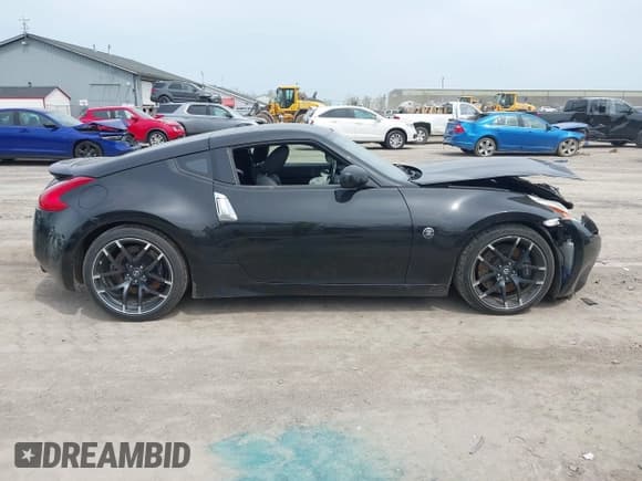 ✅ 2009 Nissan 370Z Touring • VIN: JN1AZ44E29M407088 • Lot: 42130157. Listed on IAAI with 51,735 mi. Free auction sales archive from the USA and detailed vehicle history report at DreamBid. Image 12.
