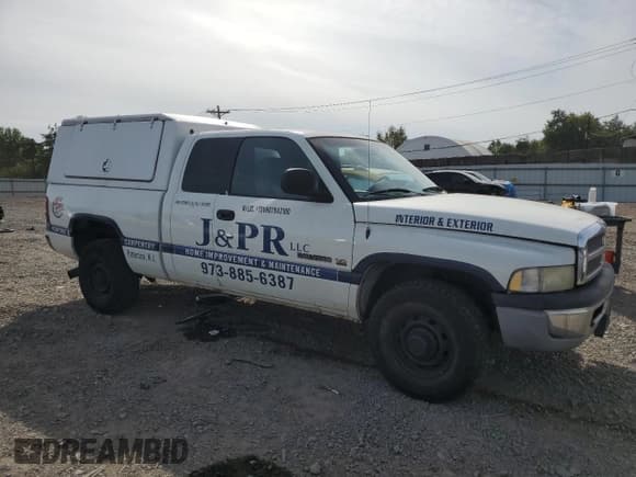 ✅ 2002 Dodge 2500 • VIN: 3B7KC23Z92M269720 • Lot: 81966685. Listed on Copart with 231,289 mi. Free auction sales archive from the USA and detailed vehicle history report at DreamBid. Image 4.