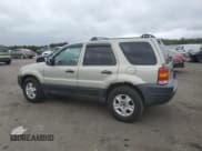 ✅ 2003 Ford Escape XLT Popular 2 • VIN: 1FMYU93173KB79464 • Lot: 67105015. Wystawiony na Copart z przebiegiem 87 593 mil. Bezpłatny archiwum sprzedaży aukcyjnych z USA i szczegółowy raport historii pojazdu na DreamBid. Zdjęcie 2.