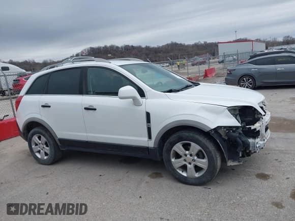✅ 2014 Chevrolet Captiva Sport LS • VIN: 3GNAL2EK4ES590762 • Lot: 41539049. Wystawiony na IAAI z przebiegiem 165 111 mil. Bezpłatny archiwum sprzedaży aukcyjnych z USA i szczegółowy raport historii pojazdu na DreamBid. Zdjęcie 14.
