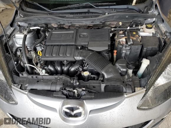 ✅ 2012 Mazda 2 Touring • VIN: JM1DE1LY5C0140236 • Лот: 71850284. Опубликован ранее на Copart с пробегом 135 566 миль. Бесплатный доступ к архиву аукционных продаж из США и подробный отчёт об истории автомобиля на DreamBid. Изображение 11.