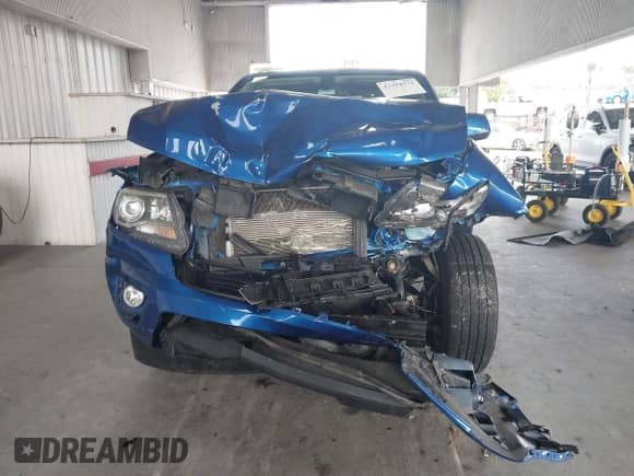 2018 Chevrolet Colorado 4WD Z71 z VIN 1GCGTDENXJ1155801, wystawiony jako IAAI lot #43394572 z przebiegiem 75 912 mil mil oraz . Historia ofert i sprzedaży dostępna na DreamBid. Obrazek 12.