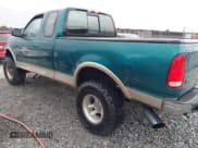 ✅ 1997 Ford F-150 XL • VIN: 1FTEX18L2VND33137 • Lot: 43578023. Wystawiony na IAAI z przebiegiem 148 923 mil. Bezpłatny archiwum sprzedaży aukcyjnych z USA i szczegółowy raport historii pojazdu na DreamBid. Zdjęcie 6.