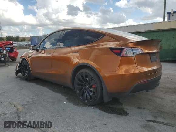 ✅ 2022 Tesla Model Y Performance • VIN: 7SAYGDEF4NF529899 • Lot: 89920025. Listed on Copart with 60,303 mi. Free auction sales archive from the USA and detailed vehicle history report at DreamBid. Image 2.