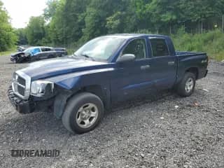 2005 Dodge Dakota ST z VIN 1D7HW28K75S110791, wystawiony jako Copart lot #64062525 z przebiegiem 245 046 mil mil oraz Szkoda całkowita • Salvage title. Historia ofert i sprzedaży dostępna na DreamBid. Obrazek 1.
