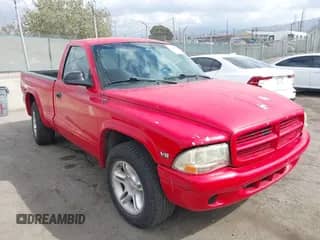 1999 Dodge Dakota SLT with VIN 1B7GL26Z5XS217114, listed as a IAAI auction lot 43418147 with 145,280 mi miles and . Bid and sale history available at DreamBid. Image 1.