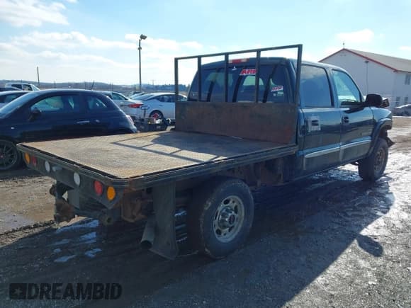 ✅ 2004 GMC Sierra 2500HD • VIN: 1GTHK23194F141150 • Lot: 41541345. Listed on IAAI with 233,501 mi. Free auction sales archive from the USA and detailed vehicle history report at DreamBid. Image 4.