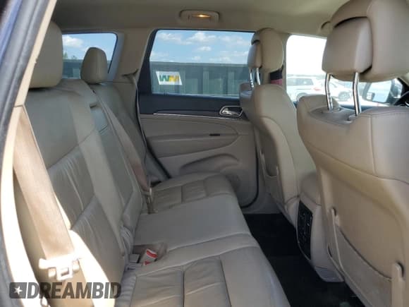 ✅ 2015 Jeep Grand Cherokee Limited • VIN: 1C4RJEBGXFC737211 • Lot: 70911715. Listed on Copart with 243,640 mi. Free auction sales archive from the USA and detailed vehicle history report at DreamBid. Image 11.