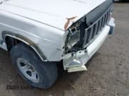 ✅ 1999 Jeep Cherokee Sport • VIN: 1J4FF68S4XL651250 • Lot: 42370723. Listed on IAAI with 203,728 mi. Free auction sales archive from the USA and detailed vehicle history report at DreamBid. Image 13.