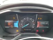 ✅ 2014 Ford Fusion Titanium • VIN: 3FA6P0D97ER125699 • Лот: 82249625. Опубликован ранее на Copart с пробегом 167 083 миль. Бесплатный доступ к архиву аукционных продаж из США и подробный отчёт об истории автомобиля на DreamBid. Изображение 9.