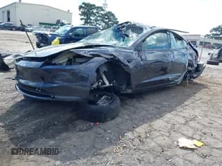 ✅ 2024 Tesla Model 3 • VIN: 5YJ3E1EA9RF856210 • Lot: 43217019. Listed on IAAI with 95,766 mi. Free auction sales archive from the USA and detailed vehicle history report at DreamBid. Image 2.