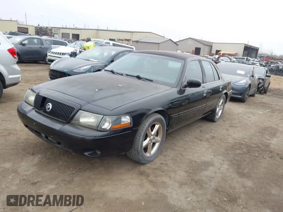 ✅ 2003 Mercury Marauder • VIN: 2MEHM75V33X634153 • Lot: 43727873. Wystawiony na IAAI z przebiegiem 145 007 mil. Bezpłatny archiwum sprzedaży aukcyjnych z USA i szczegółowy raport historii pojazdu na DreamBid. Zdjęcie 2.