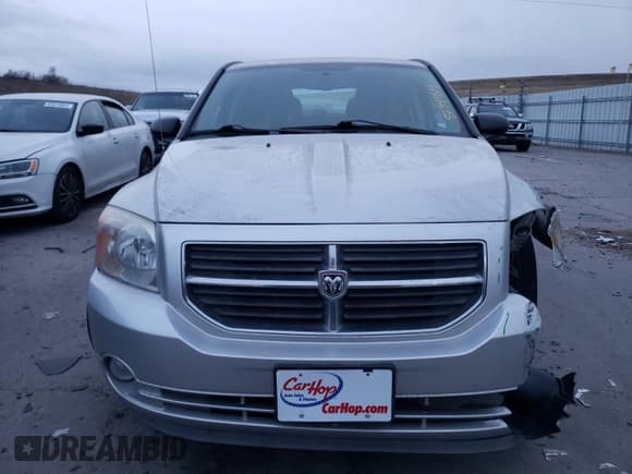 ✅ 2012 Dodge Caliber SXT • VIN: 1C3CDWDA1CD532317 • Лот: 82389814. Опубликован ранее на Copart с пробегом 100 122 миль. Бесплатный доступ к архиву аукционных продаж из США и подробный отчёт об истории автомобиля на DreamBid. Изображение 5.