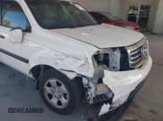 ✅ 2014 Honda Pilot LX • VIN: 5FNYF4H23EB022193 • Lot: 43584444. Listed on IAAI with 159,152 mi. Free auction sales archive from the USA and detailed vehicle history report at DreamBid. Image 6.