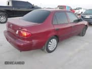 ✅ 2000 Toyota Corolla VE • VIN: 2T1BR12E9YC270164 • Lot: 43479741. Listed on IAAI with 138,128 mi. Free auction sales archive from the USA and detailed vehicle history report at DreamBid. Image 4.