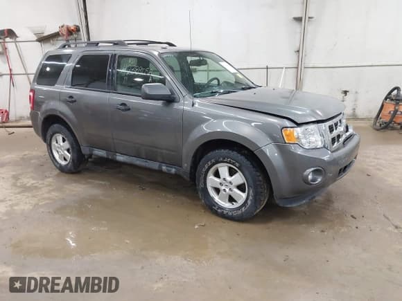 ✅ 2011 Ford Escape XLT • VIN: 1FMCU9DG7BKB21690 • Lot: 42389058. Listed on IAAI with 147,308 mi. Free auction sales archive from the USA and detailed vehicle history report at DreamBid. Image 1.