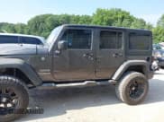 ✅ 2017 Jeep Wrangler Unlimited Sport • VIN: 1C4BJWDG4HL558332 • Lot: 42916328. Listed on IAAI with 104,928 mi. Free auction sales archive from the USA and detailed vehicle history report at DreamBid. Image 14.