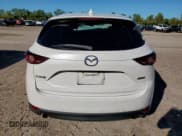 ✅ 2017 Mazda CX-5 Touring • VIN: JM3KFACL8H0218886 • Lot: 90433085. Wystawiony na Copart z przebiegiem 106 698 mil. Bezpłatny archiwum sprzedaży aukcyjnych z USA i szczegółowy raport historii pojazdu na DreamBid. Zdjęcie 6.