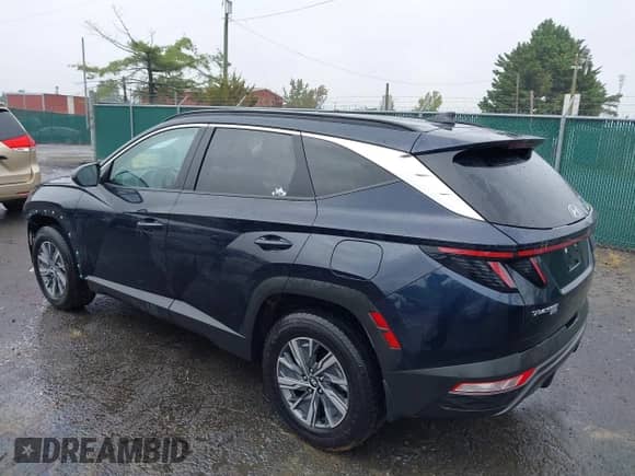 2023 Hyundai Tucson Blue z VIN KM8JBCA10PU092863, wystawiony jako IAAI lot #43233471 z przebiegiem 53 213 mil mil oraz . Historia ofert i sprzedaży dostępna na DreamBid. Obrazek 3.