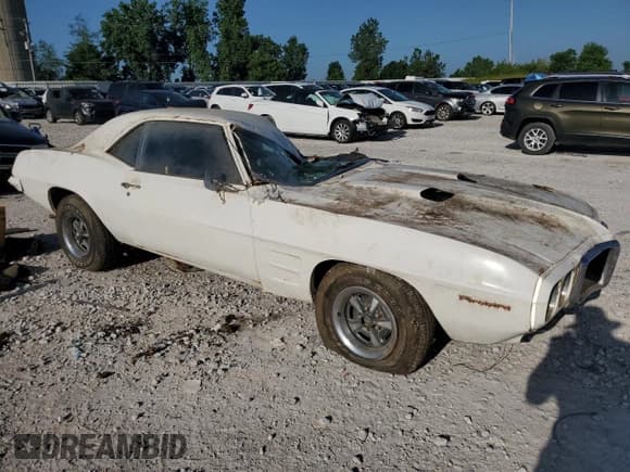✅ 1969 Pontiac Firebird • VIN: 223379U134459 • Лот: 60249995. Опубликован ранее на Copart с пробегом Не указан. Бесплатный доступ к архиву аукционных продаж из США и подробный отчёт об истории автомобиля на DreamBid. Изображение 4.