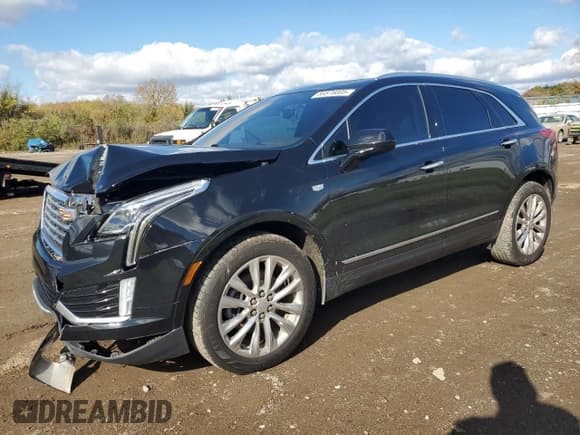 ✅ 2017 Cadillac XT5 Platinum AWD • VIN: 1GYKNFRS5HZ202934 • Lot: 89576005. Listed on Copart with 91,457 mi. Free auction sales archive from the USA and detailed vehicle history report at DreamBid. Image 1.