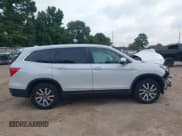 ✅ 2021 Honda Pilot EX-L • VIN: 5FNYF6H56MB025156 • Лот: 42706595. Опубликован ранее на IAAI с пробегом 92 419 миль. Бесплатный доступ к архиву аукционных продаж из США и подробный отчёт об истории автомобиля на DreamBid. Изображение 14.