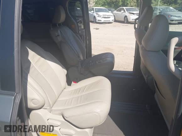 2011 Toyota Sienna XLE AAS with VIN 5TDYK3DC8BS073331, listed as a IAAI auction lot 43099376 with 145,679 mi miles and . Bid and sale history available at DreamBid. Image 8.