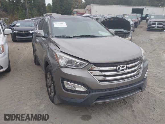 ✅ 2014 Hyundai Santa Fe • VIN: 5XYZUDLB0EG150479 • Lot: 43361152. Listed on IAAI with 163,969 mi. Free auction sales archive from the USA and detailed vehicle history report at DreamBid. Image 1.