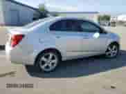 2014 Chevrolet Sonic LTZ с VIN 1G1JE5SG1E4128009, выставлен на аукционе Copart как лот 54007785 с пробегом 146 811 миль миль и Списание • Salvage title. История ставок и продаж доступна на DreamBid. Изображение 3.