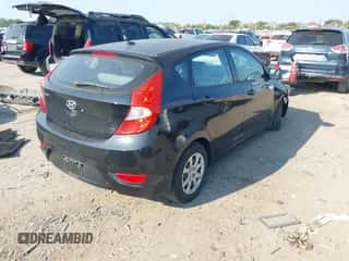 2013 Hyundai Accent GS with VIN KMHCT5AE6DU084637, listed as a IAAI auction lot 43226223 with 200,530 mi miles and . Bid and sale history available at DreamBid. Image 4.