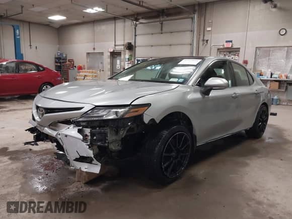 2021 Toyota Camry XSE with VIN 4T1K61BK4MU030236, listed as a IAAI auction lot 41723055 with 117,435 mi miles and . Bid and sale history available at DreamBid. Image 6.