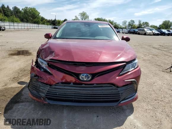 2021 Toyota Camry Hybrid LE с VIN 4T1C31AKXMU032183, выставлен на аукционе Copart как лот 70869765 с пробегом 39 267 миль миль и Списание • Salvage title. История ставок и продаж доступна на DreamBid. Изображение 5.