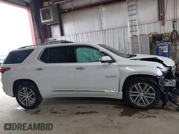2022 Chevrolet Traverse High Country z VIN 1GNEVNKW6NJ181569, wystawiony jako IAAI lot #43291682 z przebiegiem 25 120 mil mil oraz . Historia ofert i sprzedaży dostępna na DreamBid. Obrazek 13.