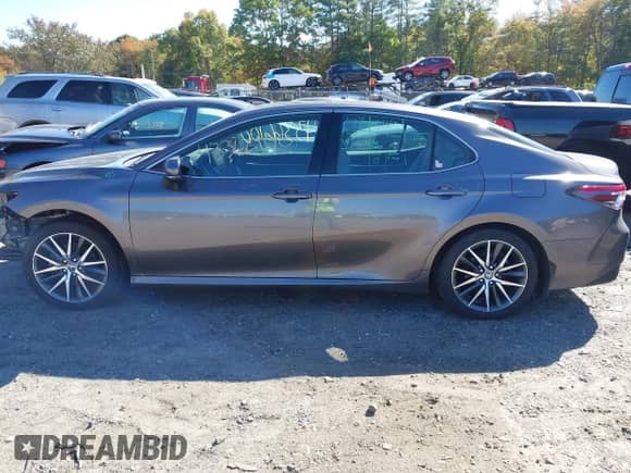 2023 Toyota Camry Hybrid XLE с VIN 4T1F31AK0PU053612, выставлен на аукционе IAAI как лот 43366100 с пробегом 74 858 миль миль и . История ставок и продаж доступна на DreamBid. Изображение 15.