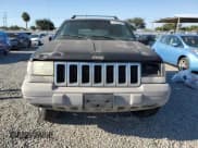 ✅ 1998 Jeep Grand Cherokee Laredo • VIN: 1J4FX58S6WC294787 • Лот: 71563695. Опубликован ранее на Copart с пробегом 198 537 миль. Бесплатный доступ к архиву аукционных продаж из США и подробный отчёт об истории автомобиля на DreamBid. Изображение 5.