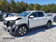 ✅ 2019 Honda Ridgeline RTL-E • VIN: 5FPYK3F74KB010111 • Lot: 87009015. Wystawiony na Copart z przebiegiem 130 763 mil. Bezpłatny archiwum sprzedaży aukcyjnych z USA i szczegółowy raport historii pojazdu na DreamBid. Zdjęcie 1.