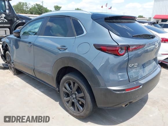 ✅ 2022 Mazda CX-30 S Carbon Edition • VIN: 3MVDMBCL6NM410330 • Lot: 42107426. Listed on IAAI with 30,277 mi. Free auction sales archive from the USA and detailed vehicle history report at DreamBid. Image 3.