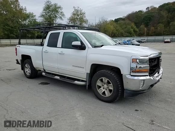 ✅ 2018 Chevrolet Silverado 1500 LT • VIN: 1GCVKREC4JZ216390 • Лот: 86743035. Опубликован ранее на Copart с пробегом 142 859 миль. Бесплатный доступ к архиву аукционных продаж из США и подробный отчёт об истории автомобиля на DreamBid. Изображение 14.