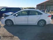 ✅ 2022 Toyota Corolla Hybrid LE • VIN: JTDEAMDE9N3005400 • Lot: 43584787. Wystawiony na IAAI z przebiegiem 58 525 mil. Bezpłatny archiwum sprzedaży aukcyjnych z USA i szczegółowy raport historii pojazdu na DreamBid. Zdjęcie 14.