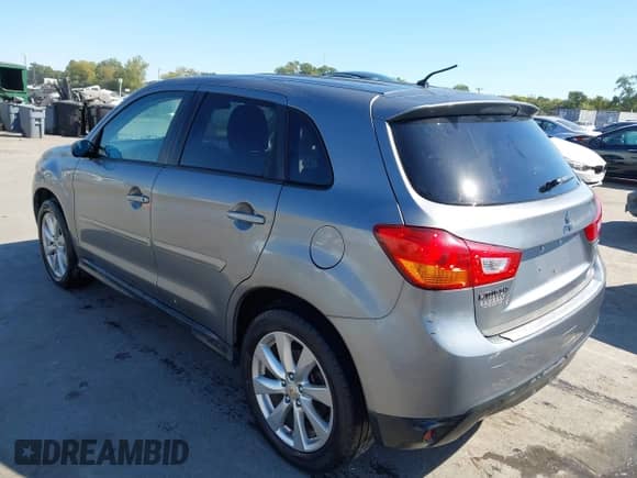 2015 Mitsubishi Outlander ES with VIN 4A4AP3AUXFE051920, listed as a IAAI auction lot 43373956 with 98,591 mi miles and . Bid and sale history available at DreamBid. Image 3.