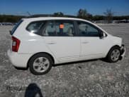 ✅ 2009 Kia Rondo LX • VIN: KNAFG528597221469 • Lot: 90896405. Wystawiony na Copart z przebiegiem 190 938 mil. Bezpłatny archiwum sprzedaży aukcyjnych z USA i szczegółowy raport historii pojazdu na DreamBid. Zdjęcie 3.