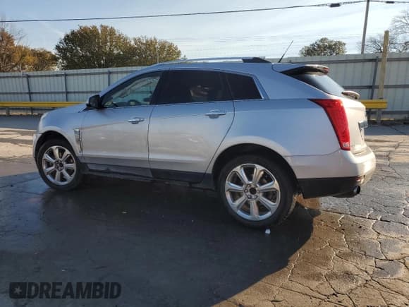 ✅ 2011 Cadillac SRX Performance Collection • VIN: 3GYFNBEY1BS659085 • Lot: 91114185. Listed on Copart with 147,391 mi. Free auction sales archive from the USA and detailed vehicle history report at DreamBid. Image 2.
