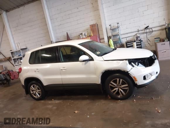 ✅ 2013 Volkswagen Tiguan S • VIN: WVGAV7AX1DW554172 • Lot: 43569906. Listed on IAAI with 127,405 mi. Free auction sales archive from the USA and detailed vehicle history report at DreamBid. Image 13.