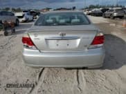 ✅ 2005 Toyota Camry LE • VIN: 4T1BF32K15U100336 • Лот: 92139575. Опубликован ранее на Copart с пробегом 228 905 миль. Бесплатный доступ к архиву аукционных продаж из США и подробный отчёт об истории автомобиля на DreamBid. Изображение 6.