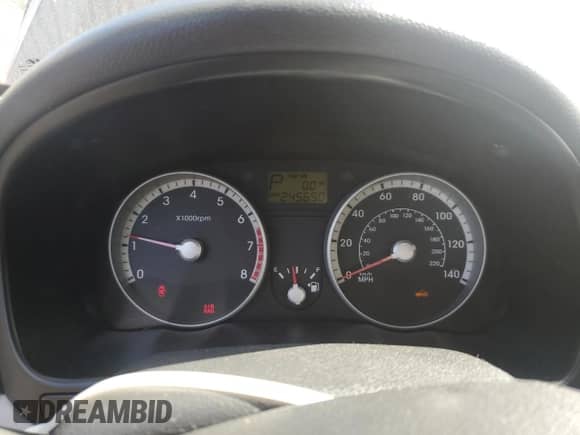 2009 Hyundai Accent Auto GLS z VIN KMHCN46C39U288766, wystawiony jako Copart lot #73111784 z przebiegiem 245 650 mil mil oraz Szkoda całkowita • Salvage title. Historia ofert i sprzedaży dostępna na DreamBid. Obrazek 9.