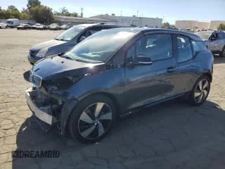 ✅ 2021 BMW i3 • VIN: WBY8P2C01M7H98318 • Лот: 76525254. Опубликован ранее на Copart с пробегом 26 276 миль. Бесплатный доступ к архиву аукционных продаж из США и подробный отчёт об истории автомобиля на DreamBid. Изображение 1.