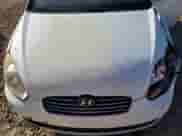 2010 Hyundai Accent GLS z VIN KMHCN4AC5AU458671, wystawiony jako Copart lot #78233554 z przebiegiem 163 090 mil mil oraz Szkoda całkowita • Salvage title. Historia ofert i sprzedaży dostępna na DreamBid. Obrazek 11.