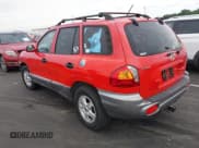 ✅ 2004 Hyundai Santa Fe GLS • VIN: KM8SC13D54U737192 • Lot: 43079988. Listed on IAAI with 208,616 mi. Free auction sales archive from the USA and detailed vehicle history report at DreamBid. Image 3.